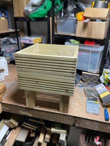 Wooden square planter with wooden legs for planets. Calf high.